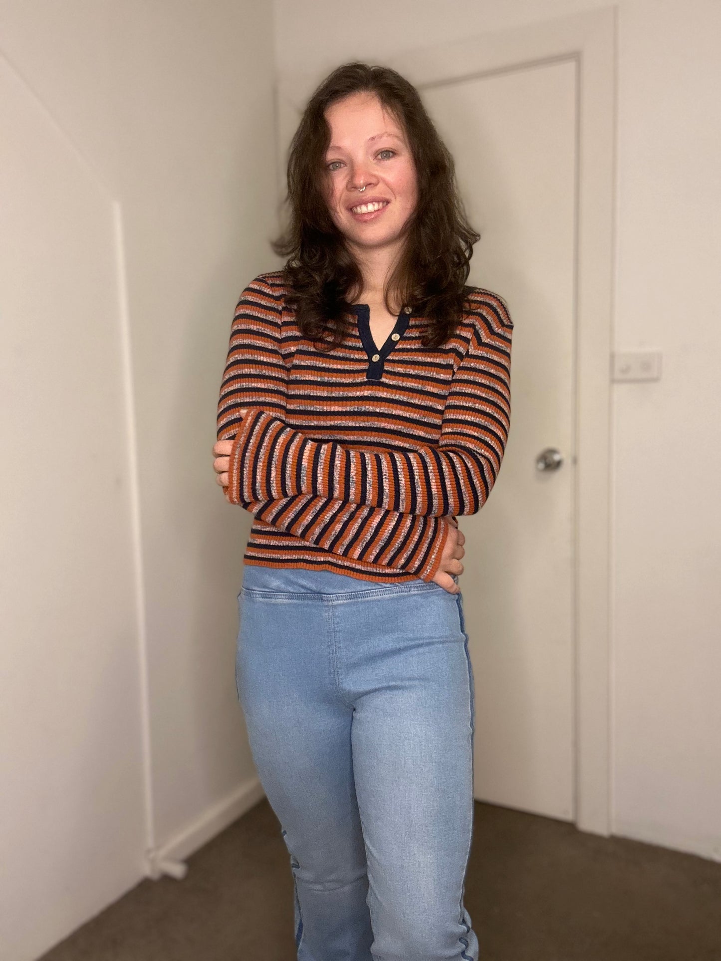Orange and navy blue striped long sleeve top