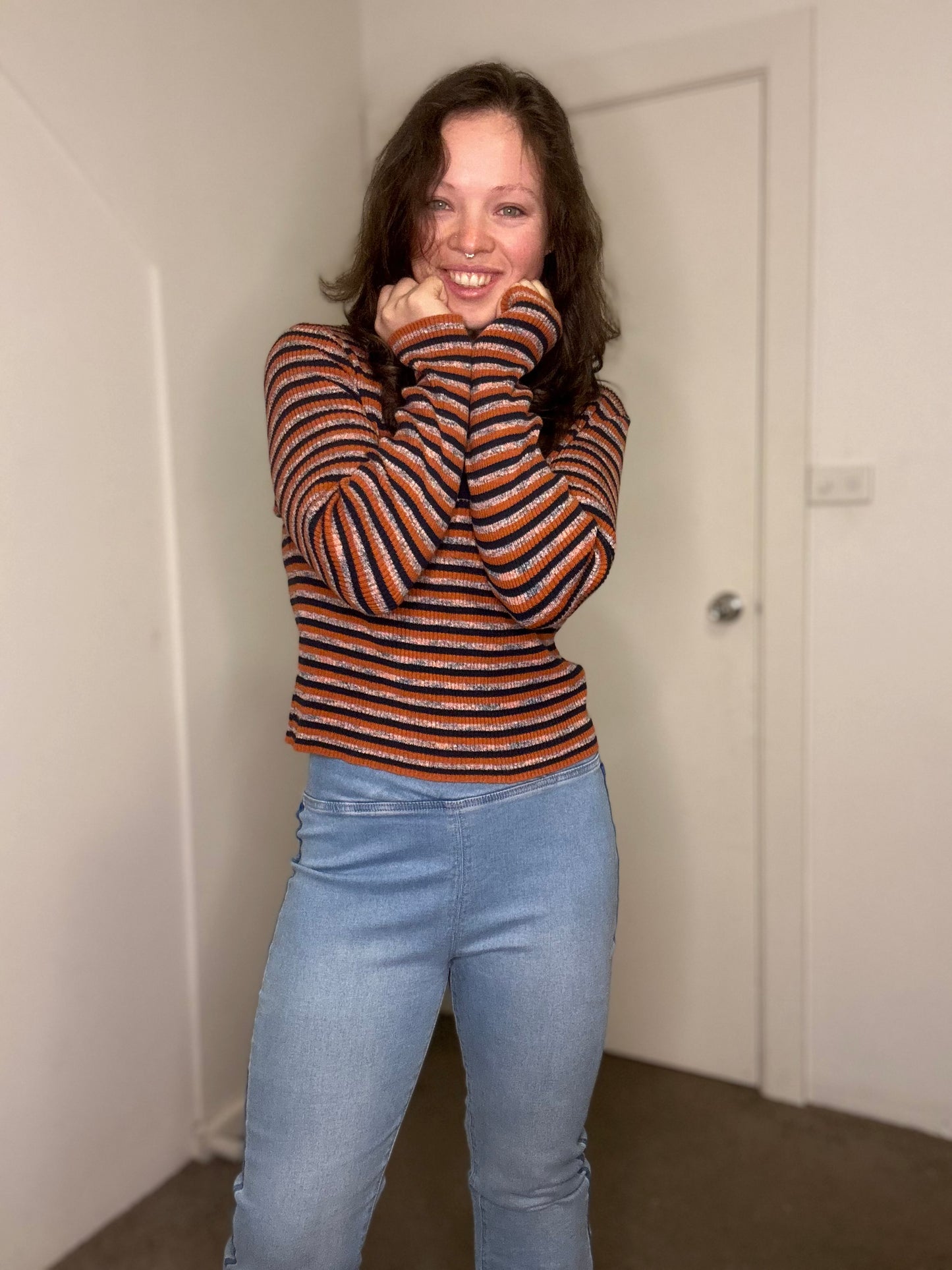 Orange and navy blue striped long sleeve top
