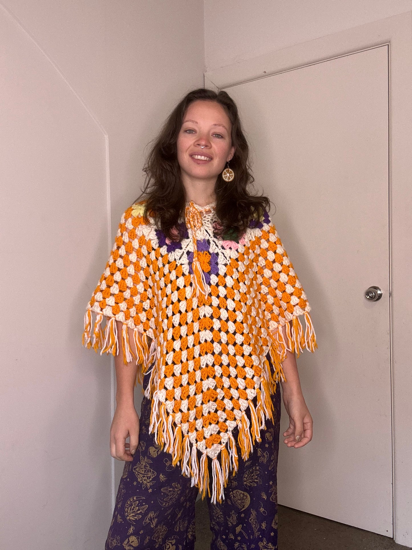 Orange crochet 60s style poncho ￼￼