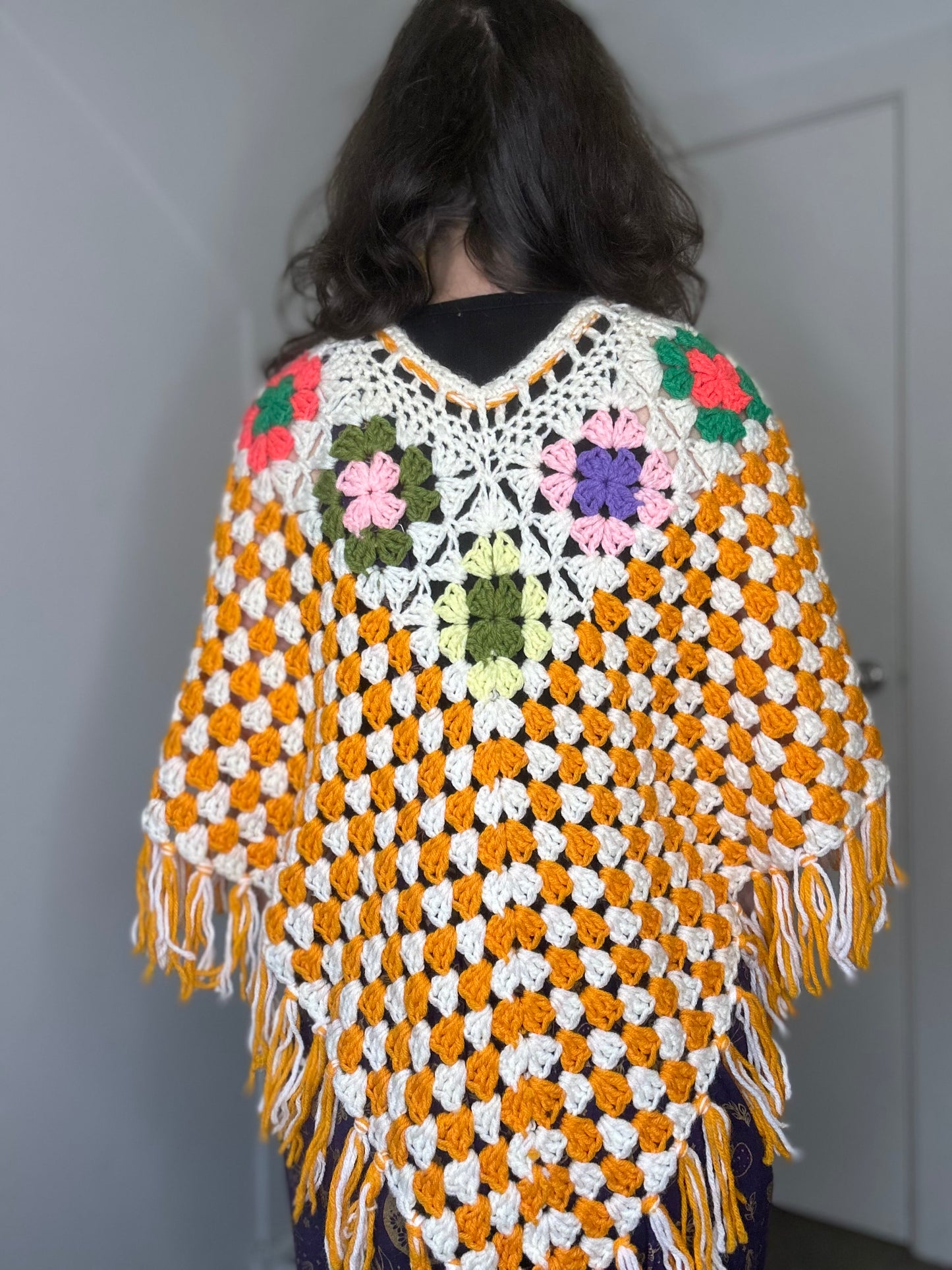 Orange crochet 60s style poncho ￼￼