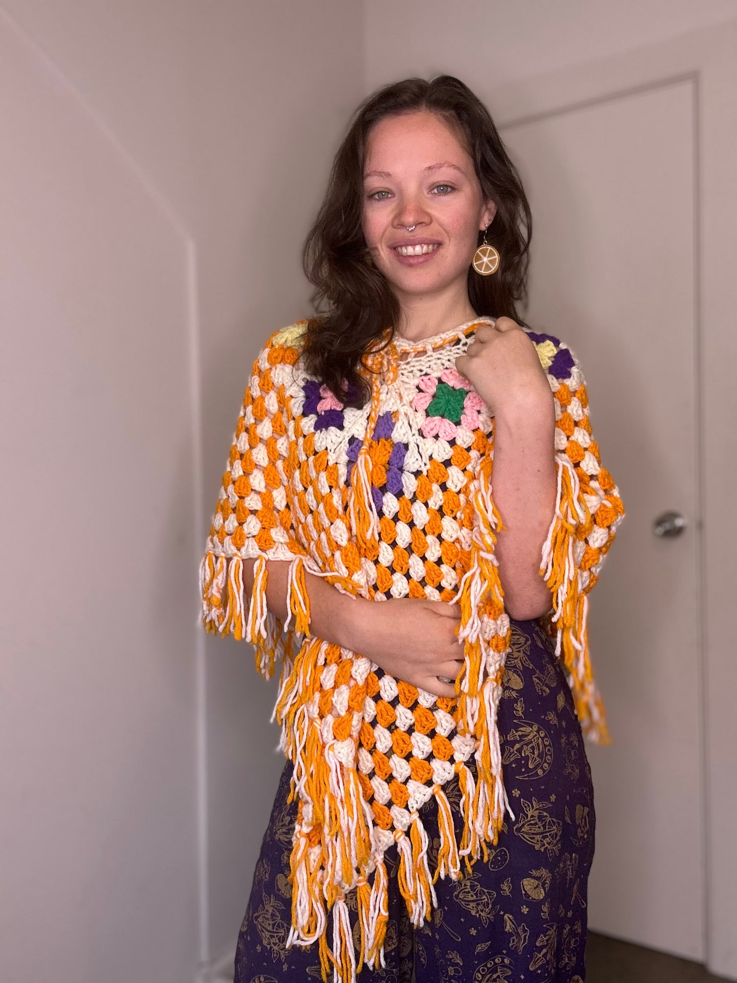 Orange crochet 60s style poncho ￼￼