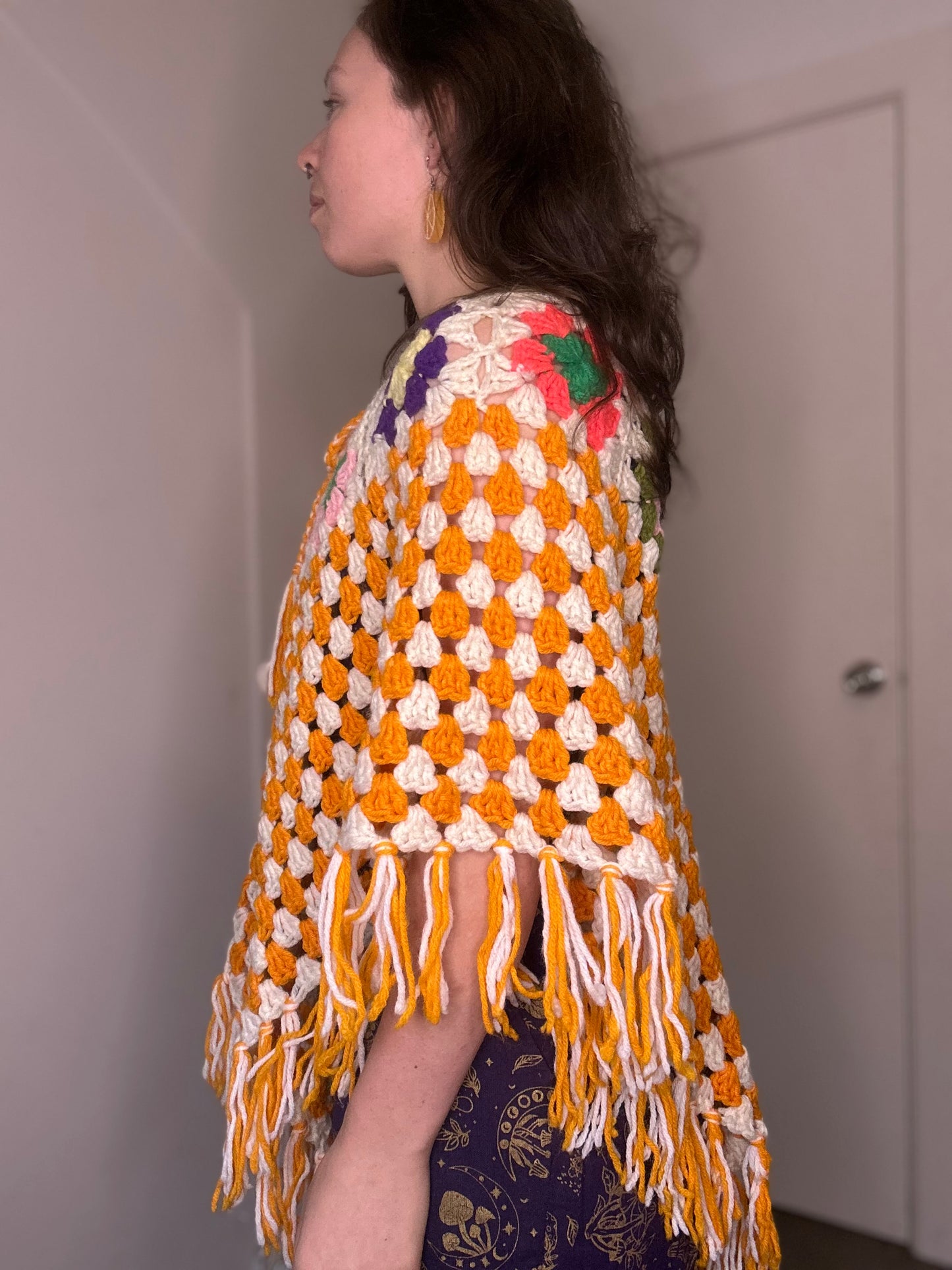 Orange crochet 60s style poncho ￼￼