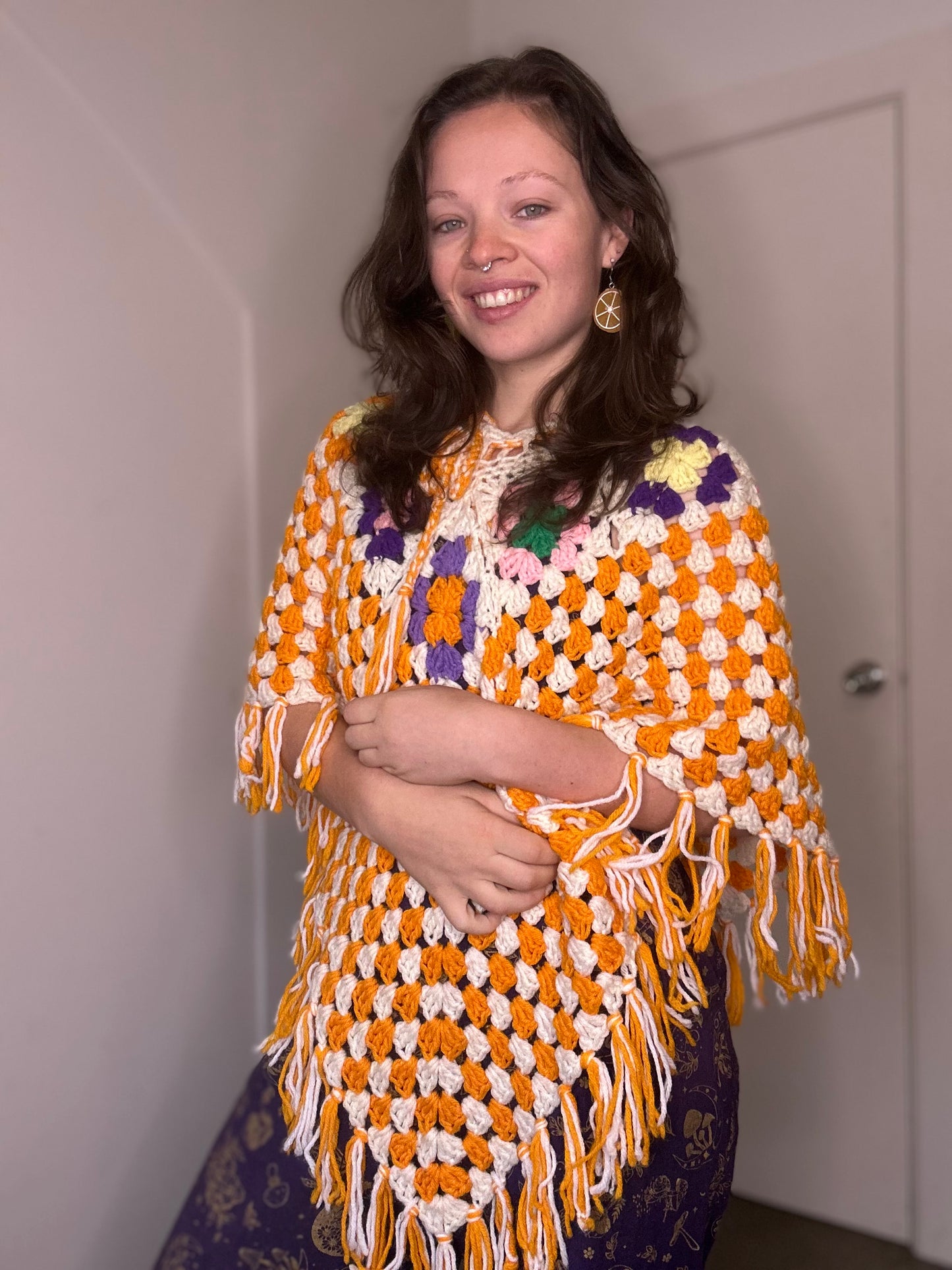 Orange crochet 60s style poncho ￼￼