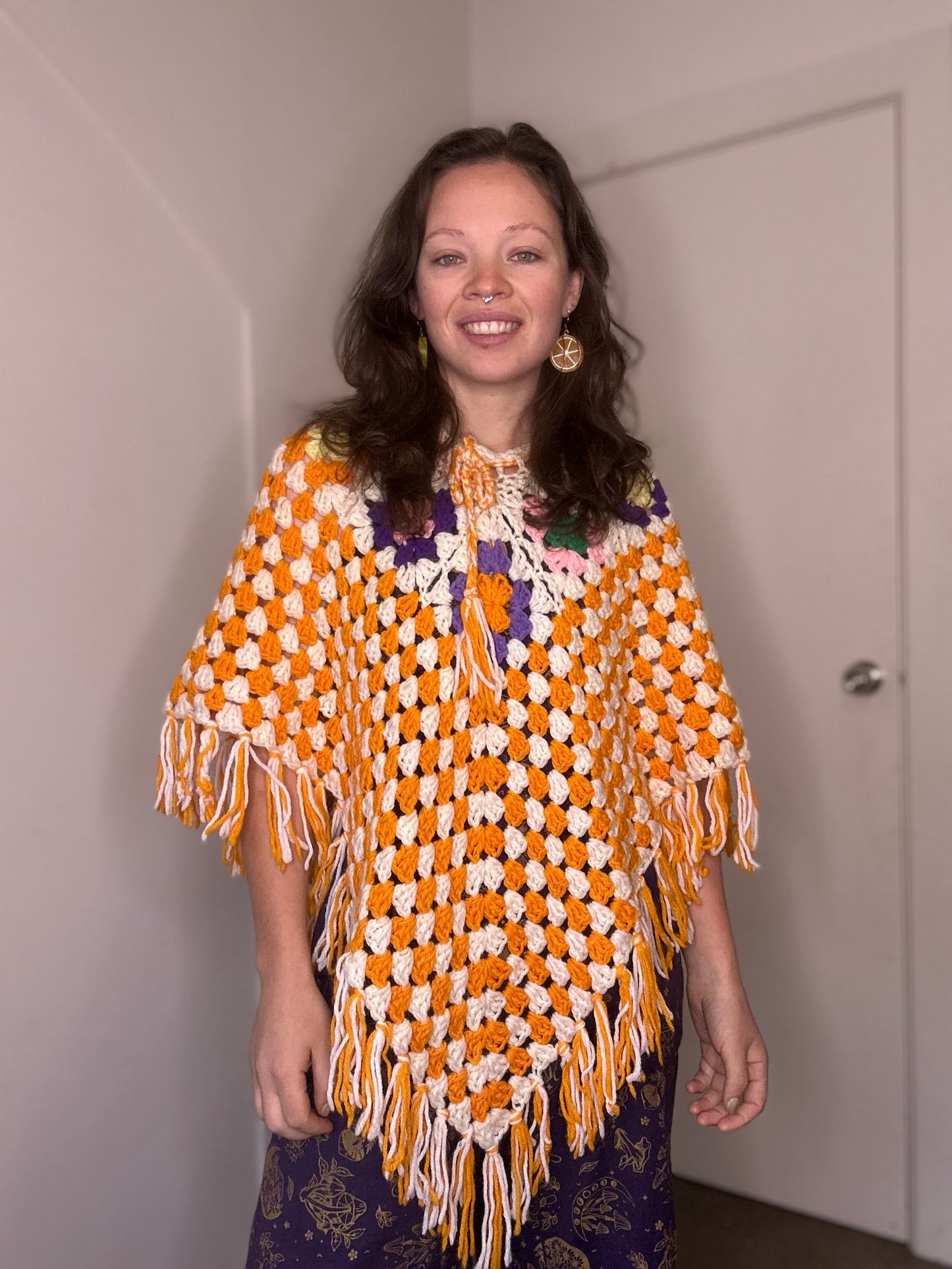 Orange crochet 60s style poncho ￼￼