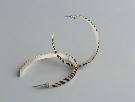 Zebra striped hooped earring